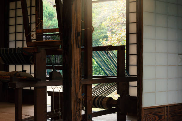 Weaving machine in old house, weaving traditional Japanese kimono.