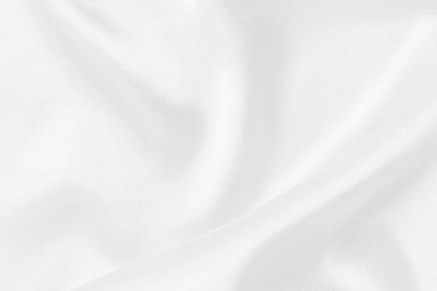 istock White fabric texture for background and design, beautiful pattern of silk or linen. 2180181409