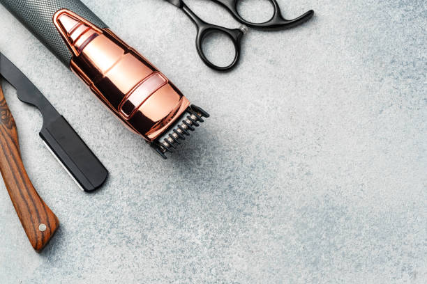 istock Set of hairdressing instruments on gray background 2180183817