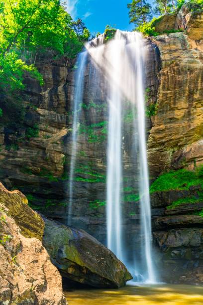 istock Majestic Waterfall in Lush Surroundings 2180187213