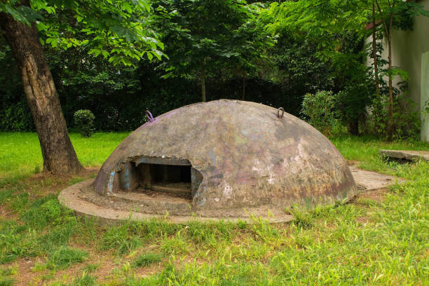 An abandoned pillbox bunker in Lulishte Ismail Qemali Park in the centre of Tirana, Central Albania. A relic from the 1960s -1980s Hoxha government's bunkerization program driven by a fear of invasion