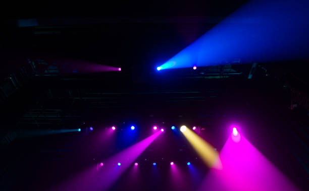 istock Colorful concert lights on empty stage 2180189428