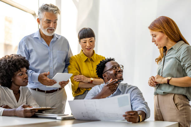 istock Diverse Team Collaborating During a Successful Business Meeting 2180196351