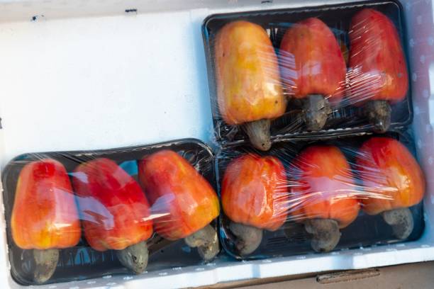 istock Packaged fresh cashew apples ready for sale. 2180196369