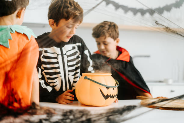 istock Family decorating house for halloween 2180197213