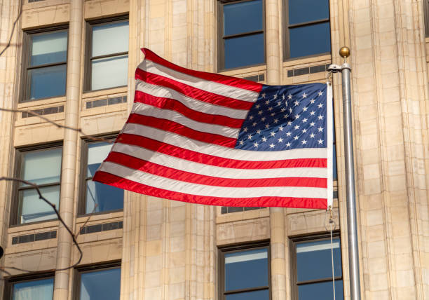 istock United States flag flying on a flagpole. 2180197718