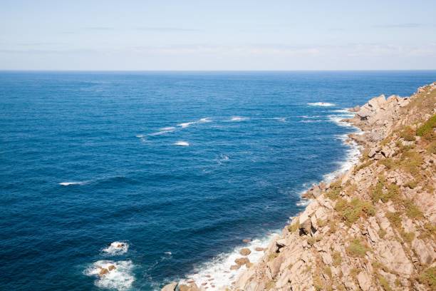 istock Scenic coastal view with rocky shoreline and blue ocean waves. 2180200086