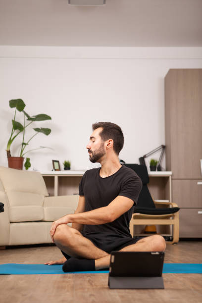 istock Man talking on video call with his girl while he's working out 2180201909