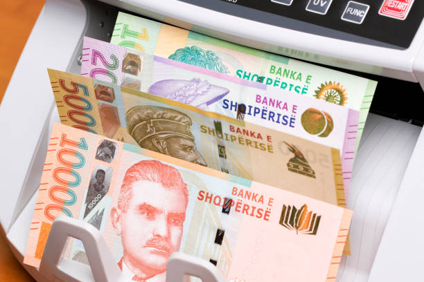 istock Albanian lek in the counting machine 2180204449