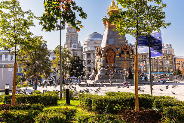 Moscow, Russia, September 29, 2023: Beautiful monument in the park with pigeons on a clear day