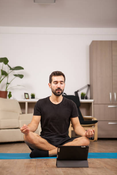 istock Man talking on video call with his girl while he's working out 2180207023