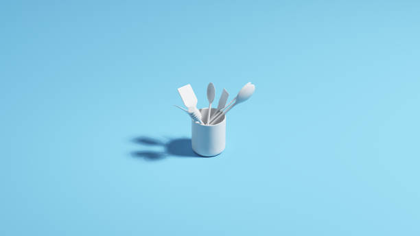 istock White kitchen utensils assorted handy spoon spatula pale blue background 2180210595