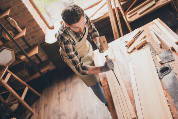 istock Top photo of builder wood worker guy working using artisan tools in garage 2180215016