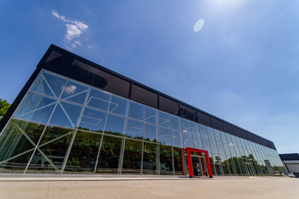 istock Modern building with red door and glass facade 2180218002