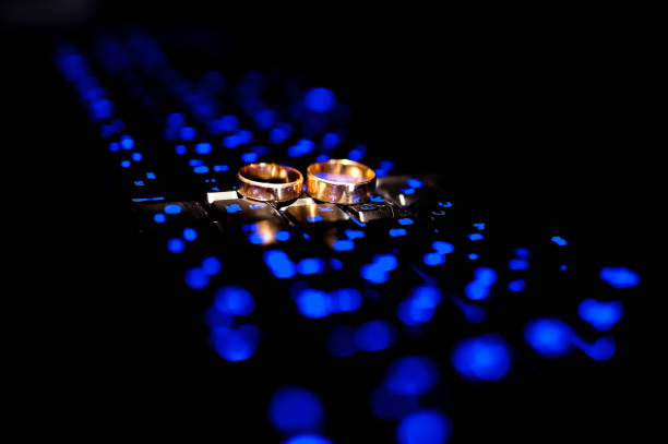 A captivating image capturing the magic of love and commitment as wedding rings gleam on a beautifully arranged table.