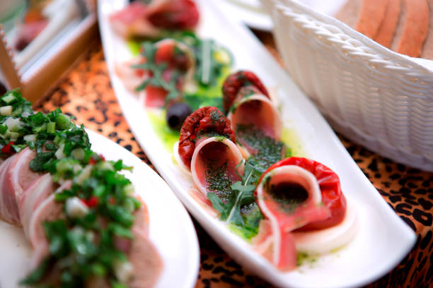 Beef Carpaccio with parmesan, Lemon oil and arugula rock Salad in seaside al fresco restaurant