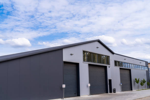 istock Exterior of modern warehouse with office units 2180222737