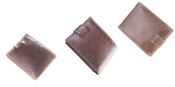 istock New brown wallet made of high quality leather isolated on white background. 2180224976