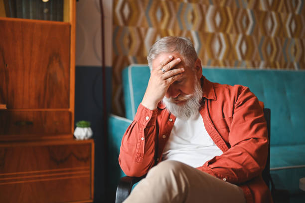 istock Mature man with emotional pain. 2180225476