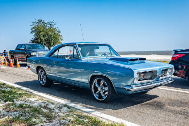 Gulfport, MS - October 03, 2023: High perspective front corner view of a 1968 Plymouth Barracuda Hardtop Coupe at a local car show.