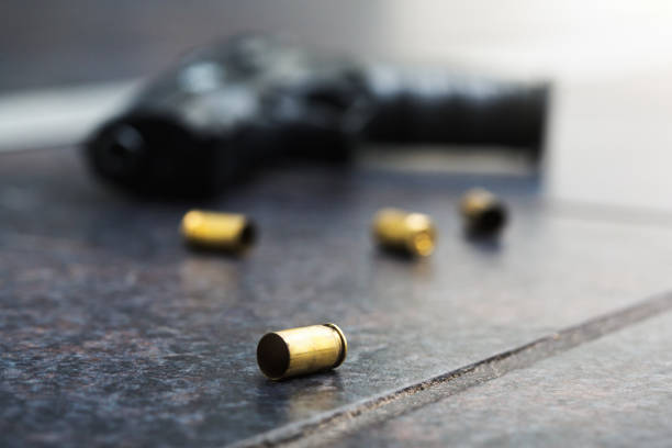 Spent cases with a handgun.