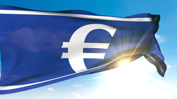 istock Euro Symbol Flag Waving in Sunny Sky 2180229858