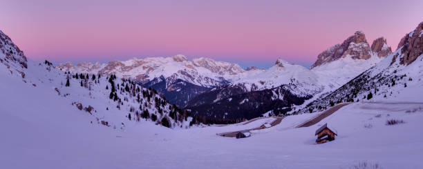 istock winter landscape in Passo Role before sunrise 2180232133