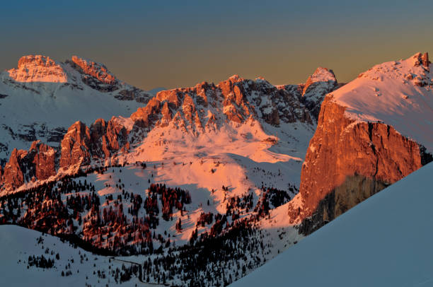 istock winter landscape in Passo Role after sunrise 2180232197