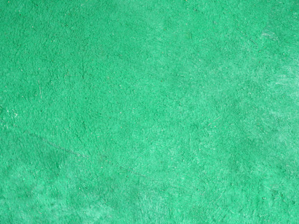 istock green cement wall, old and dirty surface. 2180234936