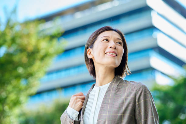 istock Asian woman commuting to work 2180235337