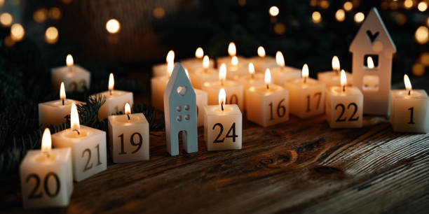 istock Advent calendar made of twenty four burning candles 2180236477