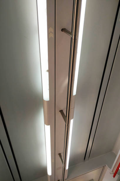 istock Modern Public Transport Interior with Bright Overhead Lighting for Urban Commute Design 2180237669