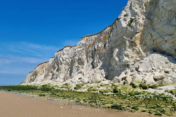 istock Majestic White Cliffs by the Sea with Clear Blue Skies 2180237705