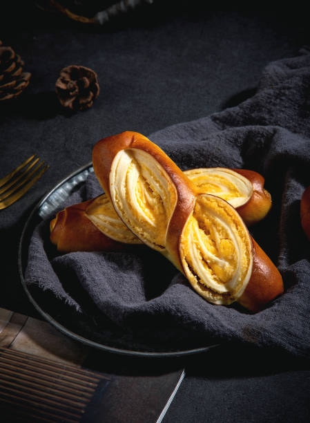 istock Baguette and lye bread on the table, top view, dark tabletop 2180237887