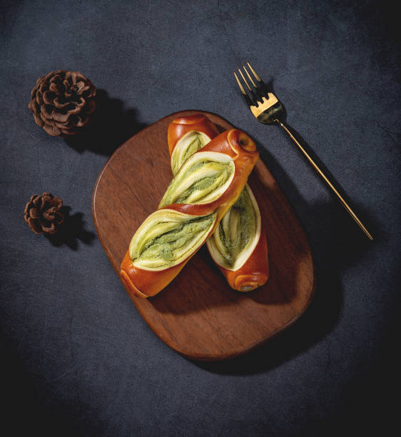 istock Baguette and lye bread on the table, top view, dark tabletop 2180237984