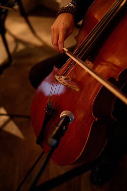 istock A musician plays a warm melody on a cello, captured during an intimate performance 2180252181