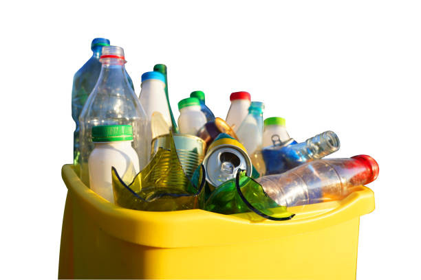 Bottles in Waste container isolated on white background. Waste sorting for Recycling. Glass bottle in trash bin container. Garbage Sorting. Trash bin bucket. Waste container with plastic bottles.