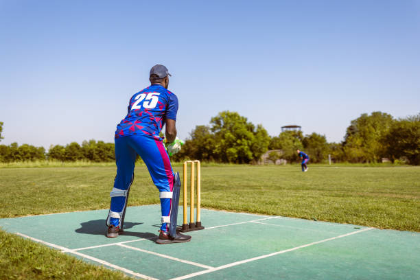 istock Cricket Player in Action on Field 2180256202