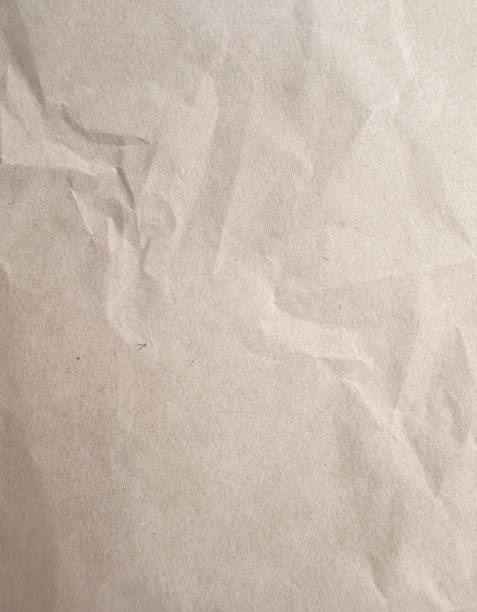 istock Beige Textured Crumpled Craft Paper Background 2180256252