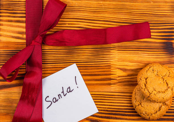 istock Note for Ambulance with red bow and cookies Christmas concept 2180256283