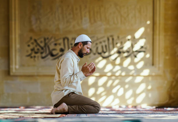 istock Muslim man praying in mosque (Namaz) 2180265294