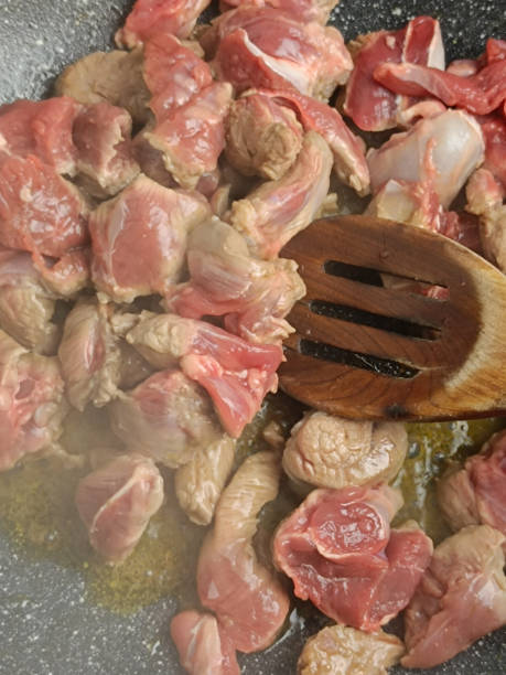 istock cooking lamb meat, close-up, in a pan 2180265407