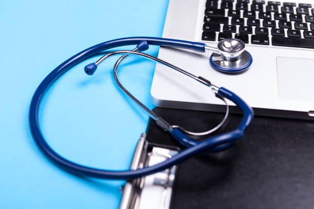 istock Medicinal stethoscope lying on a premium laptop 2180276071