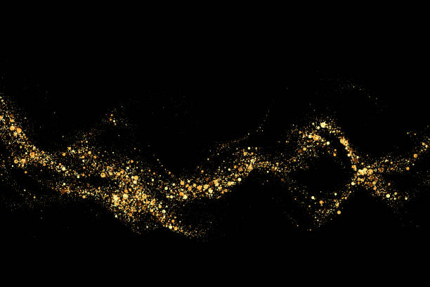 istock Texture of gold glitter, on a black background. Abstract golden color particles, confetti glitter explosion. Festive background. 2180277217