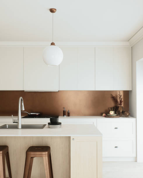 istock This is a stunning modern kitchen featuring beautiful copper accents and a sleek minimalist design 2180280117