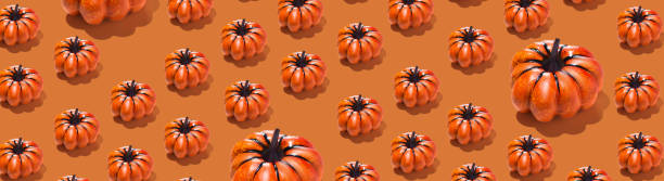 istock Autumn pattern Halloween pumpkins long banner horizontal 2180280746