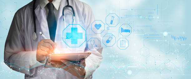 istock Description: Doctor interacting with a tablet, surrounded by medical data icons representing digital healthcare solutions. 2180282619