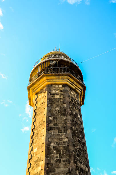 istock A tall tower with a blue sky in the background 2180283163