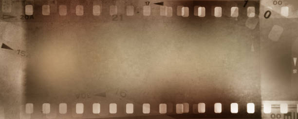 istock Film negatives brown background 2180285936