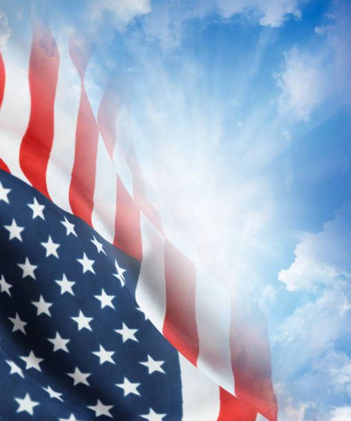 istock American flag in sky 2180286054